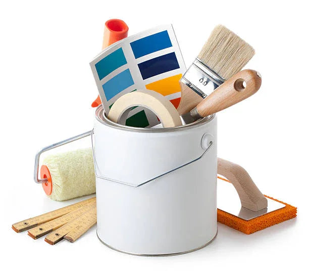 Top down view of three paint buckets with grey red and blue paint in them